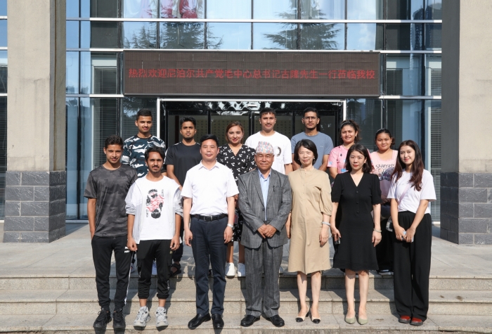 尼泊尔共产党毛中心总书记古隆先生一行来访我校